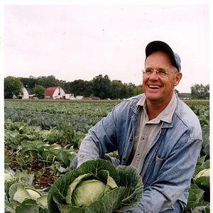Bilder Mit Mistgabel und Federboa - Farmer John