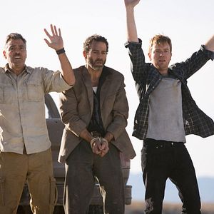 Bilder Männer, die auf Ziegen starren