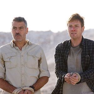 Bilder Männer, die auf Ziegen starren