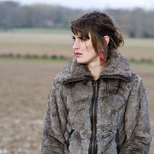 Bilder Une pute et un poussin