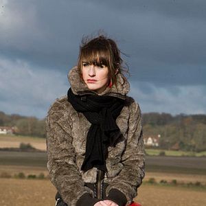 Bilder Une pute et un poussin