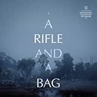 Bilder A Rifle and a Bag