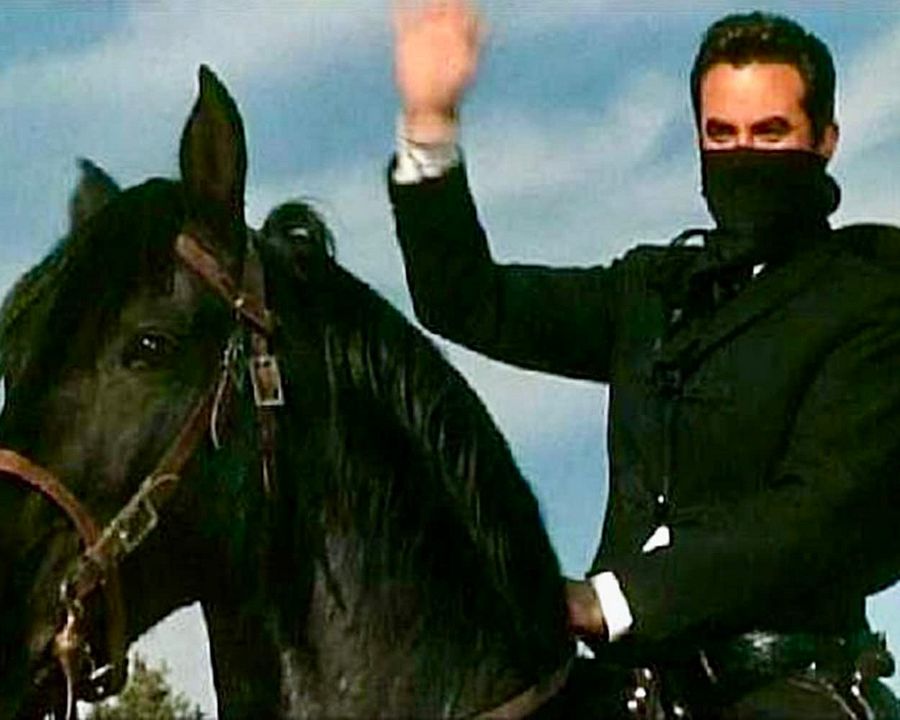 Mit Colt und Maske : Bild